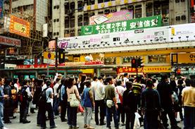 Crowd waiting to cross the street, Hong Kong.